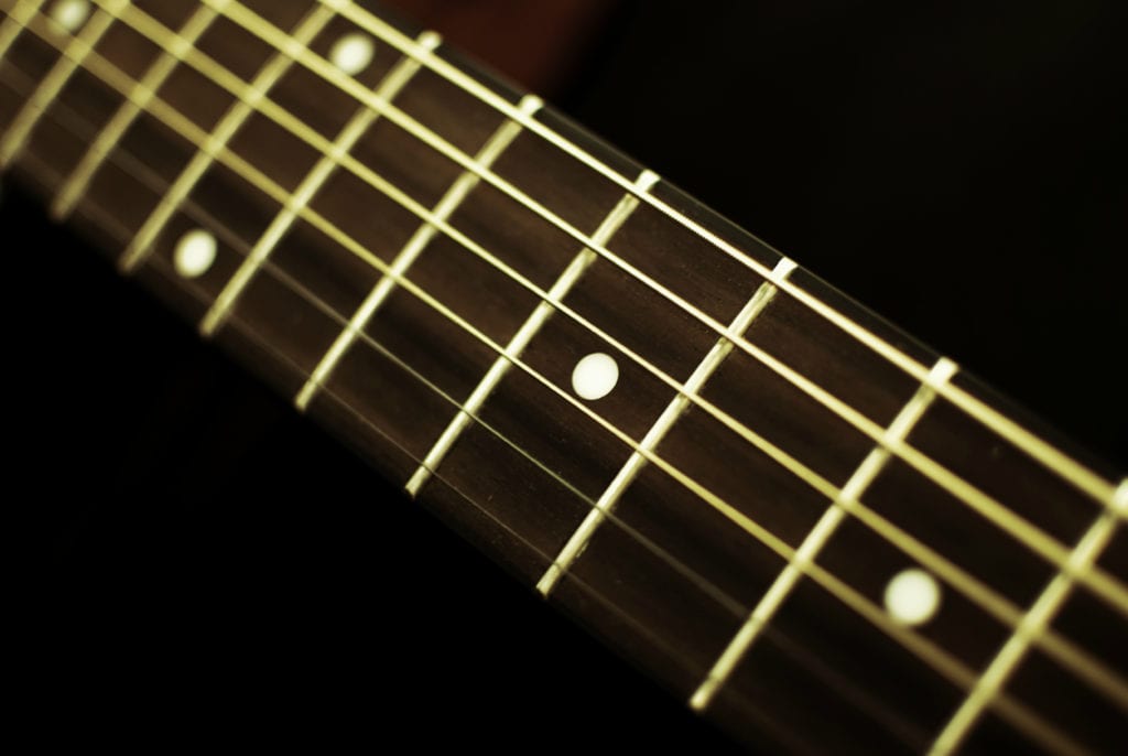 fastest way to learn guitar